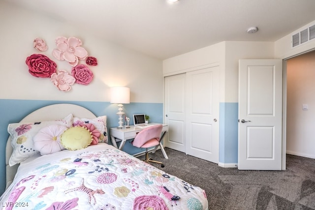 bedroom featuring a closet and carpet floors