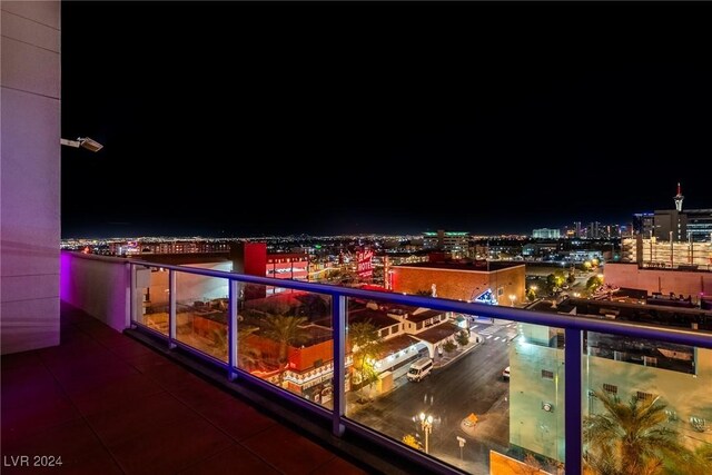 view of balcony at twilight