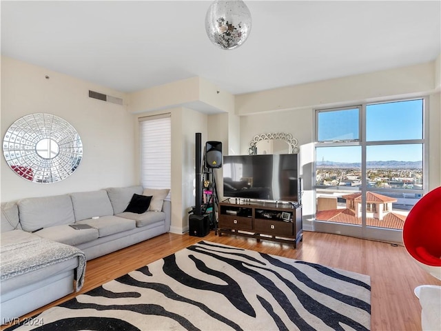 living room with wood-type flooring