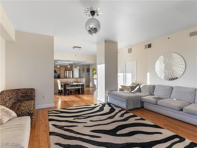 living room featuring light wood-type flooring