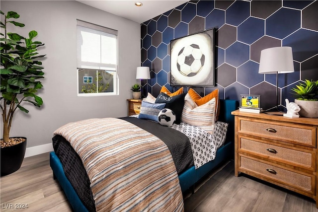 bedroom featuring wood-type flooring