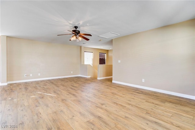 spare room with light wood-type flooring