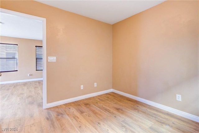 unfurnished room featuring light wood-type flooring