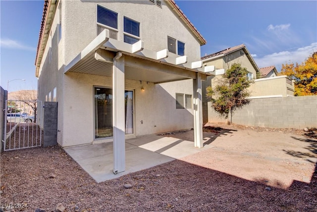 rear view of property with a patio