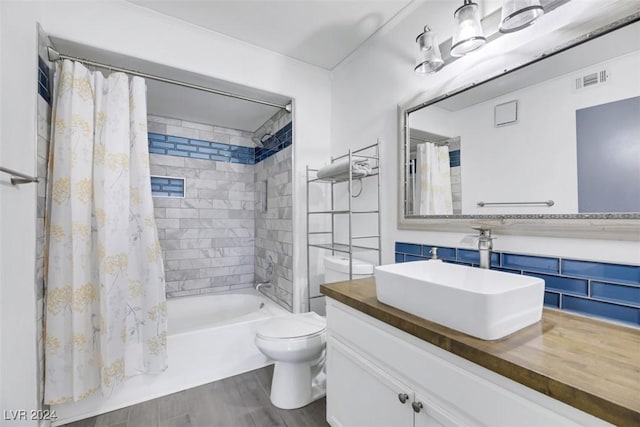 full bathroom with wood-type flooring, toilet, decorative backsplash, shower / tub combo with curtain, and vanity