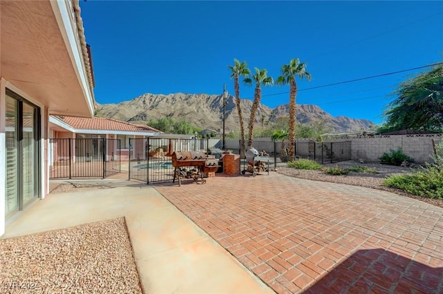 view of patio with a mountain view