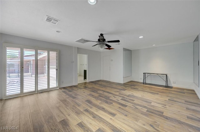 unfurnished room featuring ceiling fan and wood-type flooring