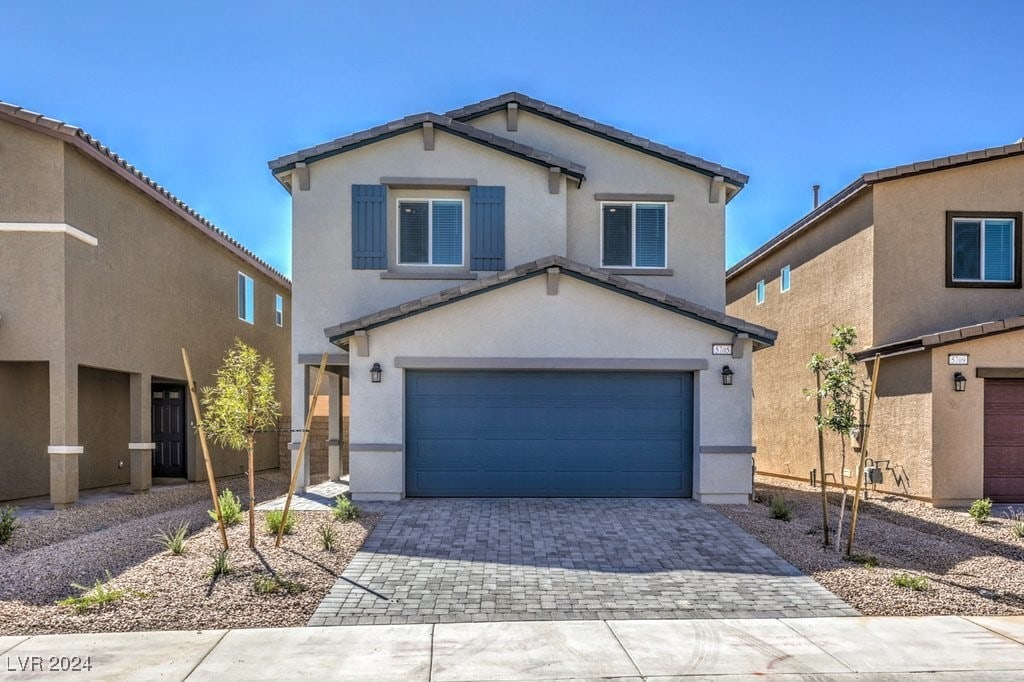 front of property featuring a garage