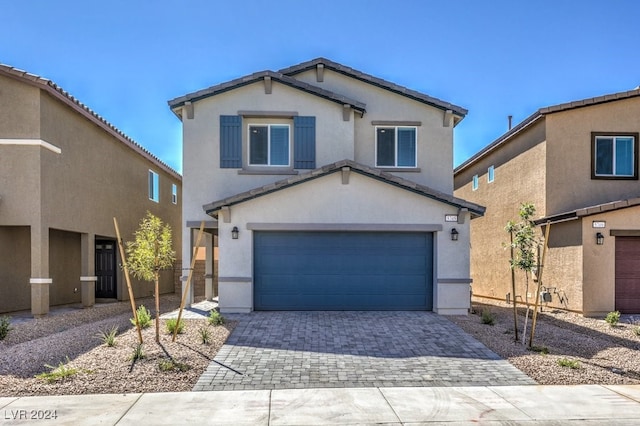 front of property featuring a garage