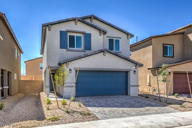 view of front of property with a garage