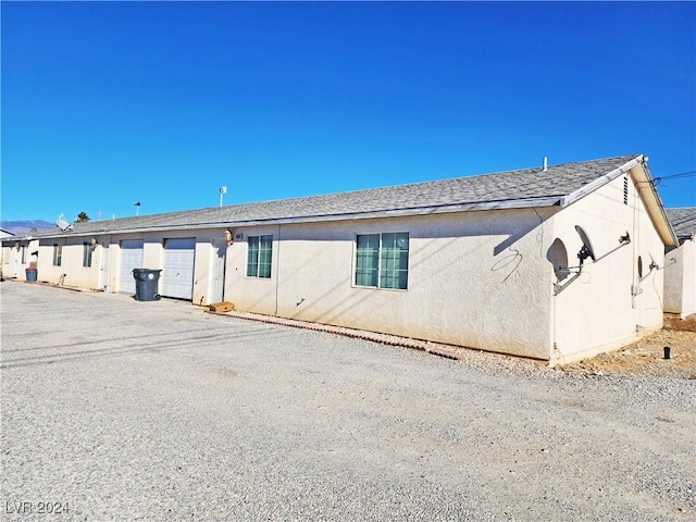 exterior space with a garage