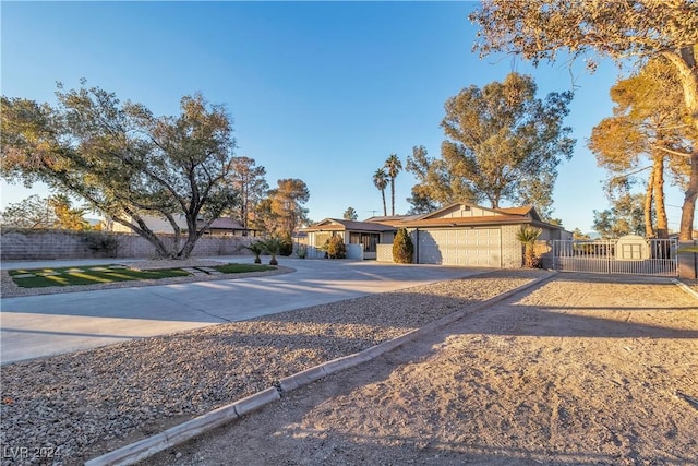 ranch-style home featuring a garage