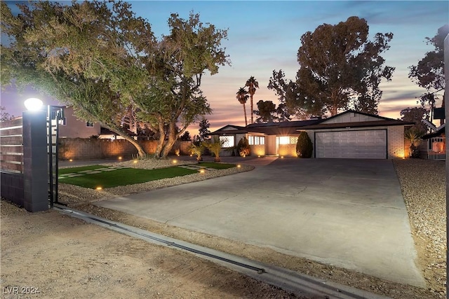 view of front of property with a garage