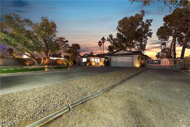 single story home featuring a garage