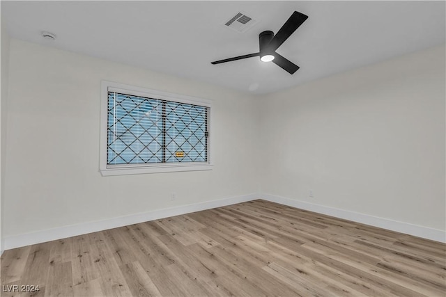 unfurnished room with ceiling fan and light hardwood / wood-style floors