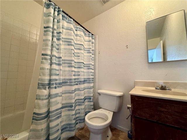 full bathroom featuring vanity, toilet, and shower / bath combo with shower curtain