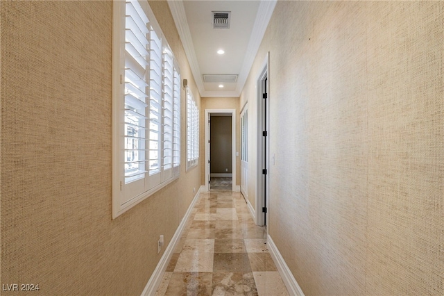 hallway with crown molding