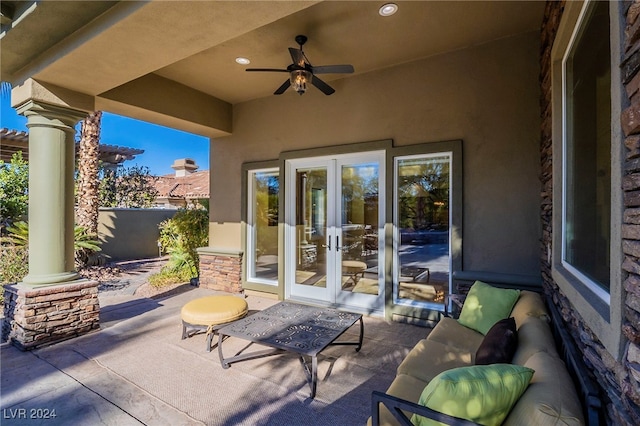 view of patio featuring french doors and ceiling fan