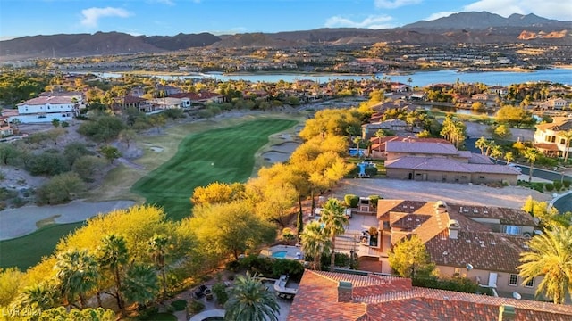 aerial view featuring a water and mountain view