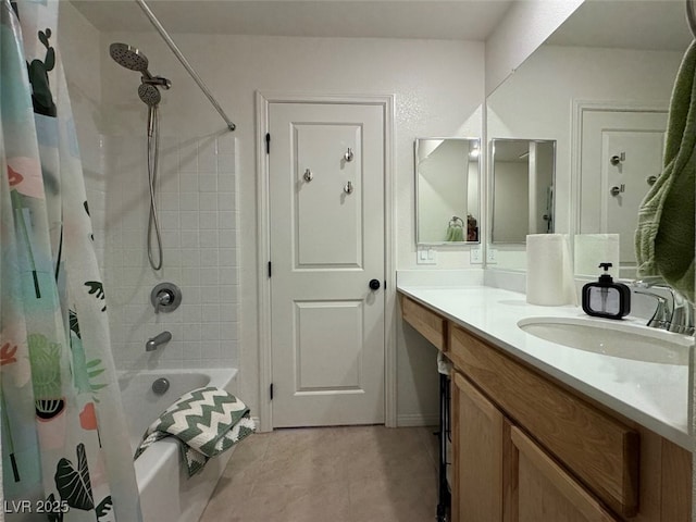 bathroom featuring vanity, tile patterned flooring, and shower / bath combo