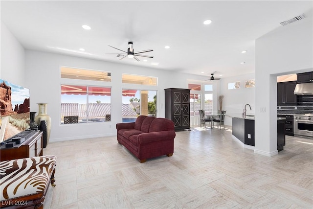 living room with ceiling fan