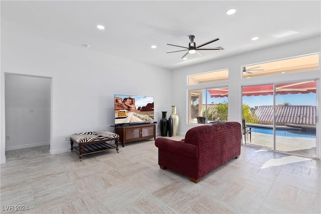 living room with ceiling fan