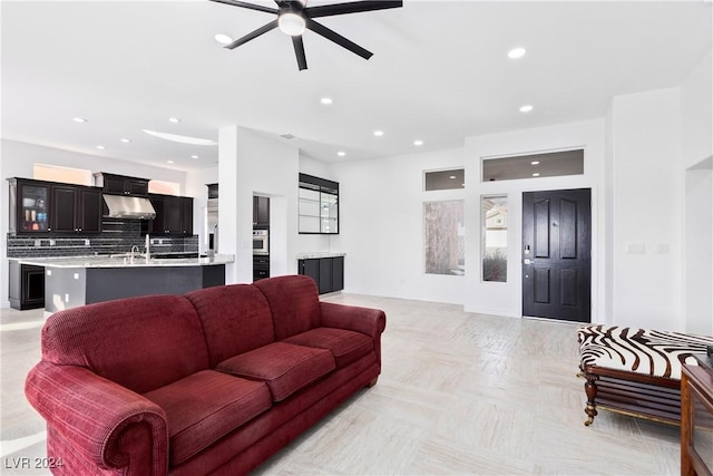 living room with ceiling fan