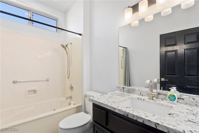 full bathroom with vanity, shower / bathing tub combination, and toilet