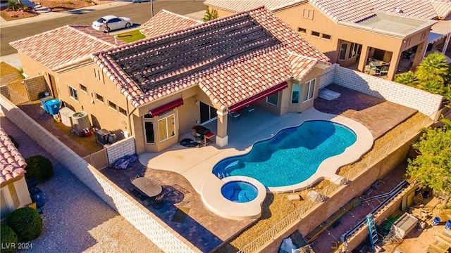 view of pool featuring central AC unit