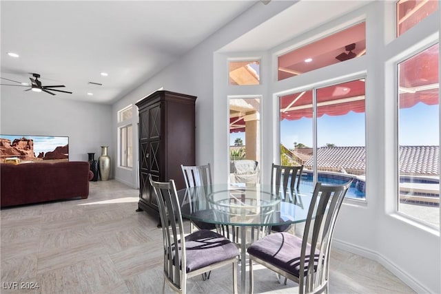 dining room featuring ceiling fan