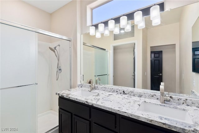 bathroom featuring vanity and walk in shower