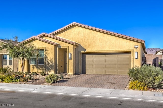 view of front of home with a garage