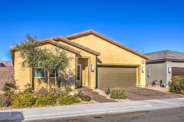 view of front of home with a garage