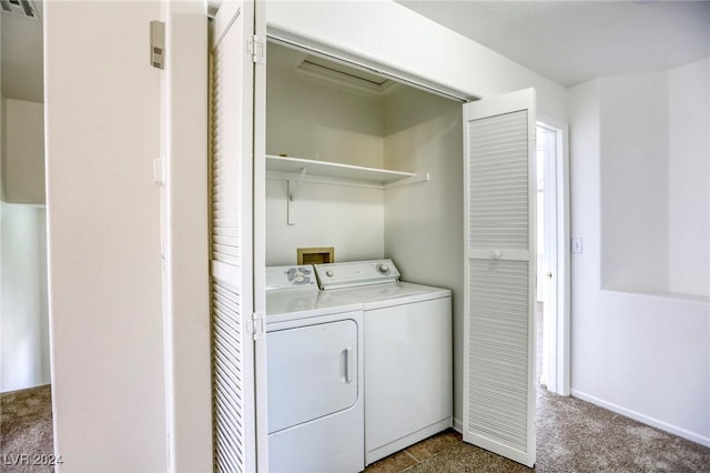 laundry room featuring carpet floors and washing machine and clothes dryer