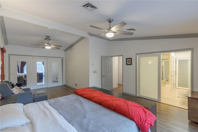 bedroom with hardwood / wood-style floors, vaulted ceiling with beams, and ceiling fan