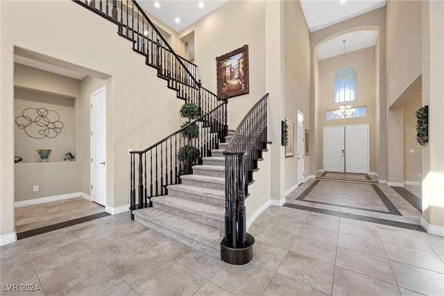 entrance foyer featuring a high ceiling