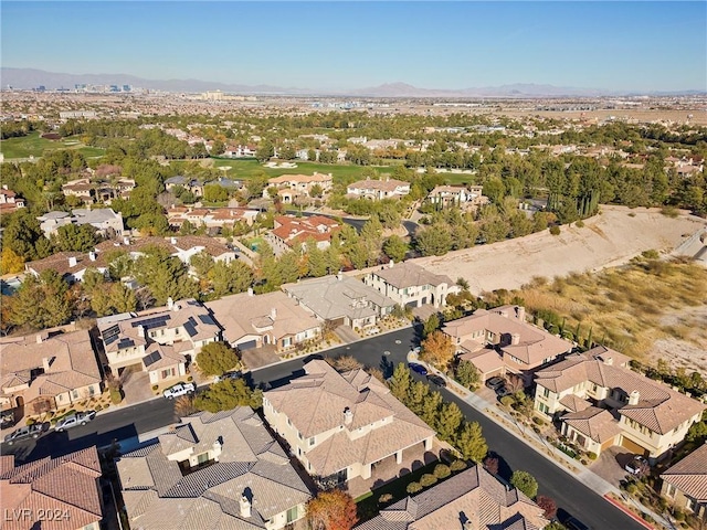 drone / aerial view featuring a mountain view