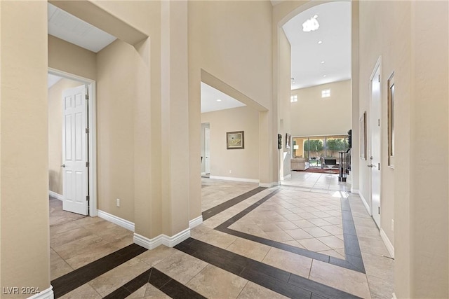 entryway featuring a high ceiling