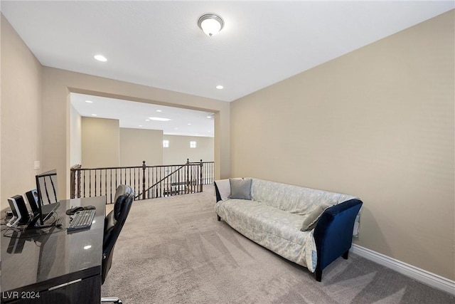 sitting room with carpet flooring