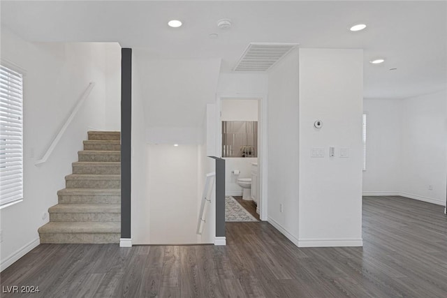 interior space with dark hardwood / wood-style flooring