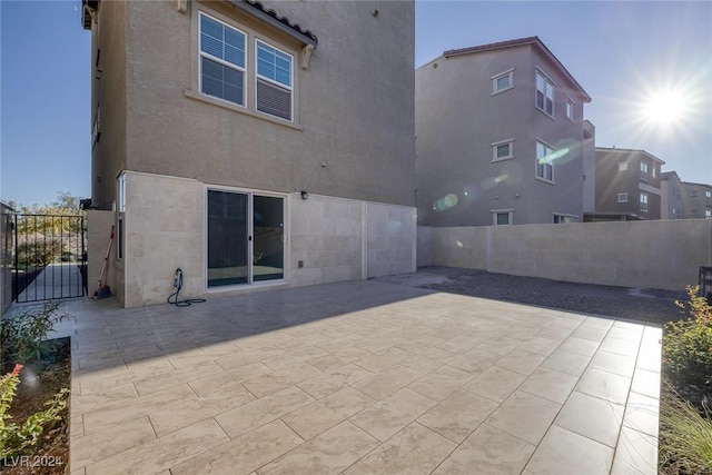 back of house featuring a patio area