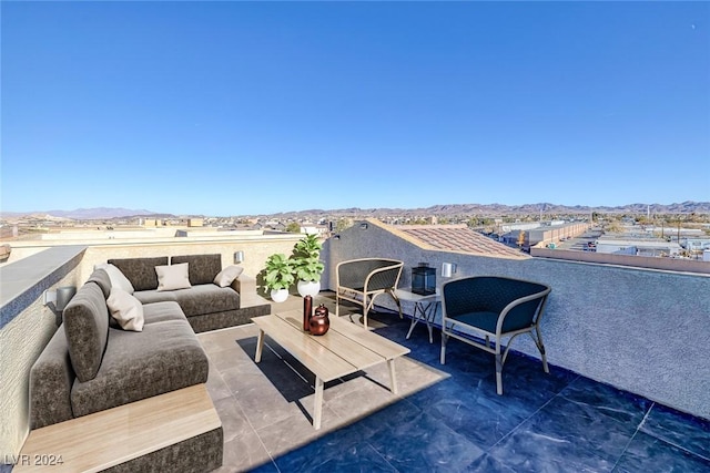 view of patio featuring a mountain view and an outdoor hangout area