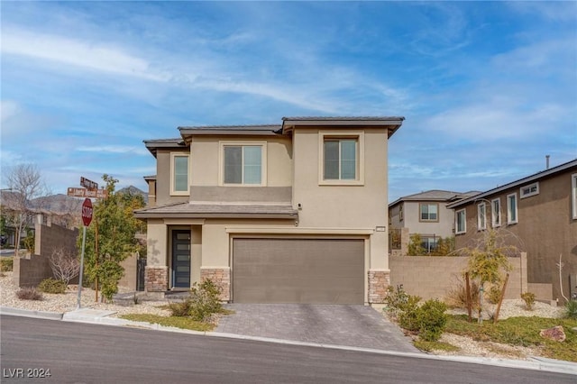 view of front of home with a garage