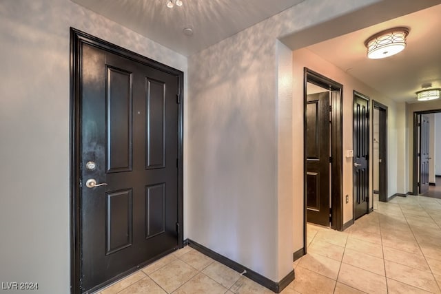 view of tiled entrance foyer