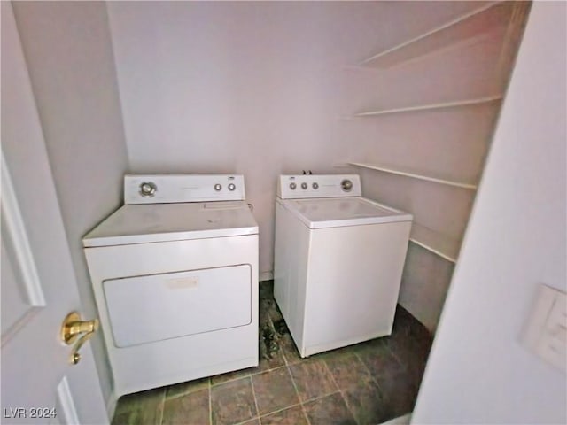 clothes washing area featuring washing machine and clothes dryer