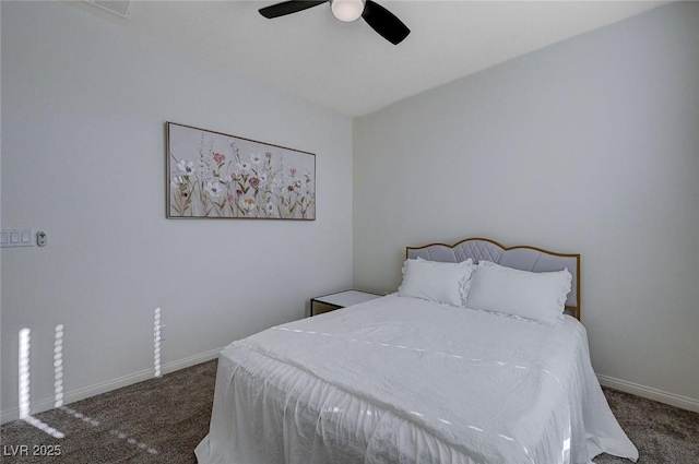 bedroom with dark carpet and ceiling fan