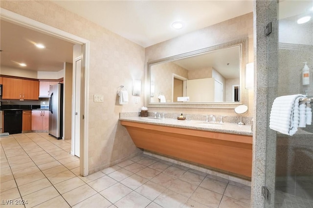 bathroom with tile patterned flooring and vanity