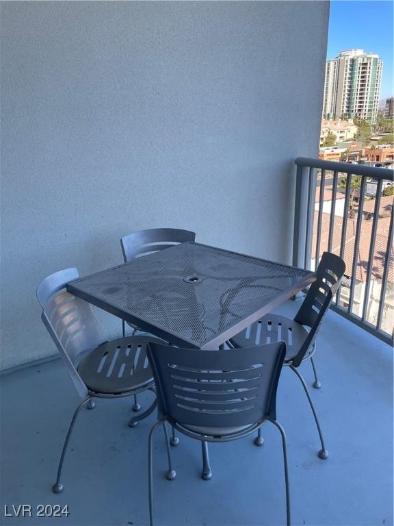 211 E Flamingo Rd Unit 614, Las Vegas, NV 89169 - balcony featuring outdoor dining space