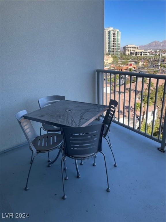 balcony featuring a mountain view