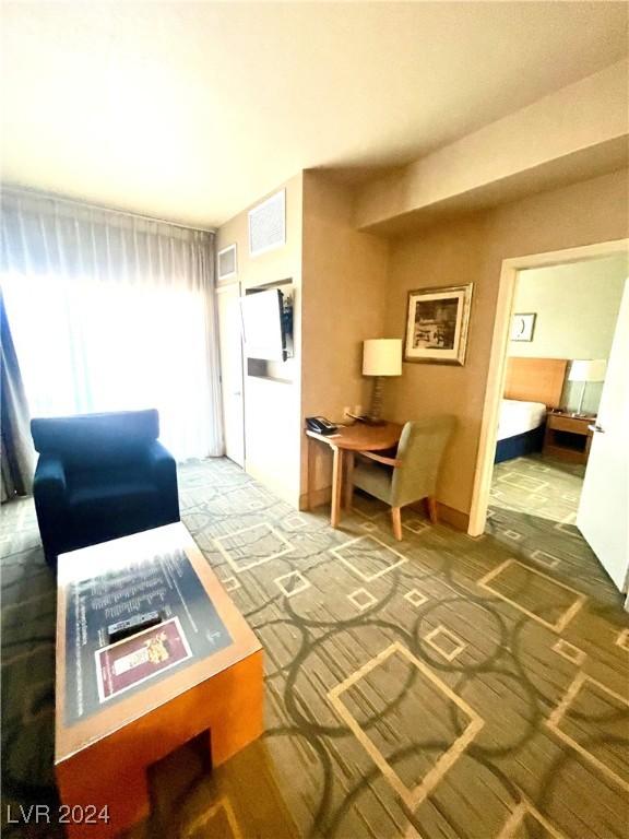 211 E Flamingo Rd Unit 614, Las Vegas, NV 89169 - living area with carpet flooring